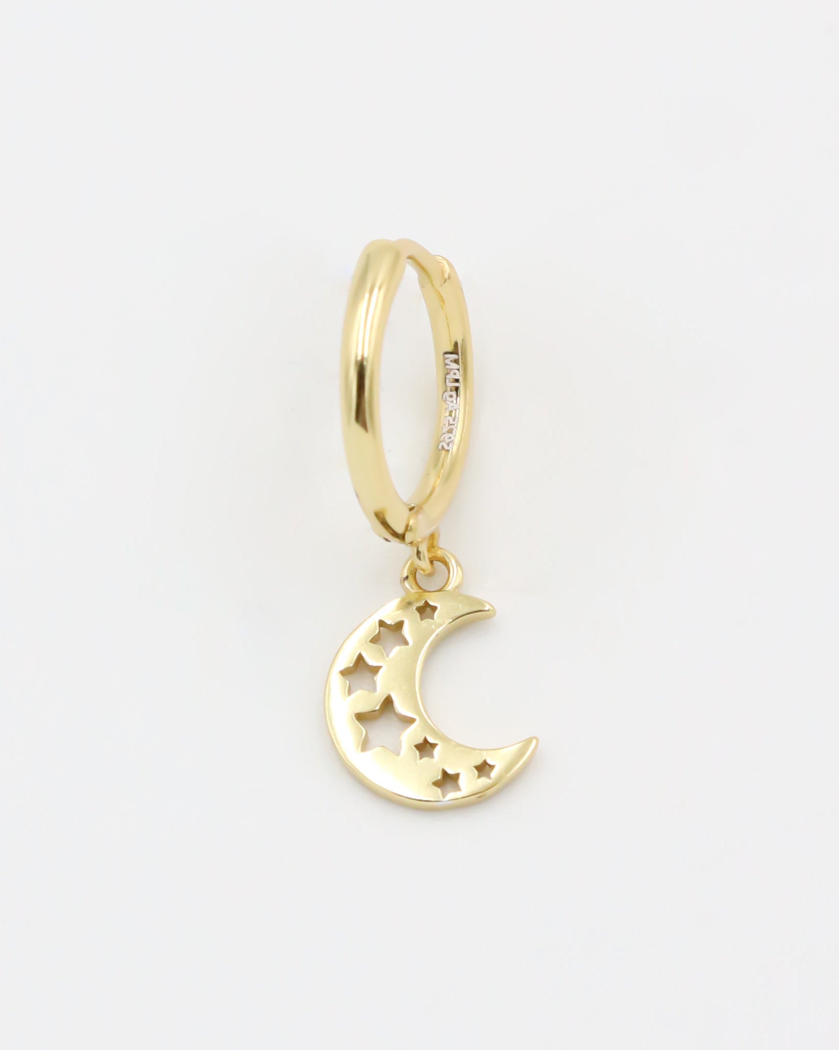 A gold-colored hoop earring with a crescent moon charm attached, set on a white background.