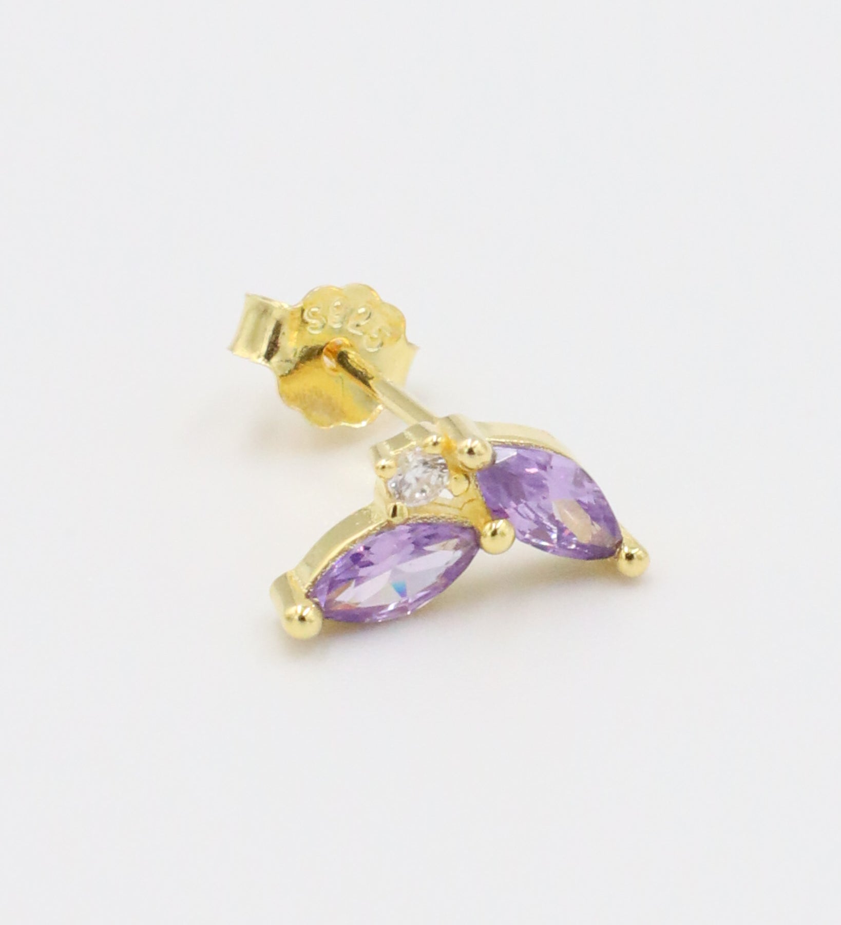 Eliza Lavender gold-plated sterling silver stud earring with purple gemstones, left ear view.