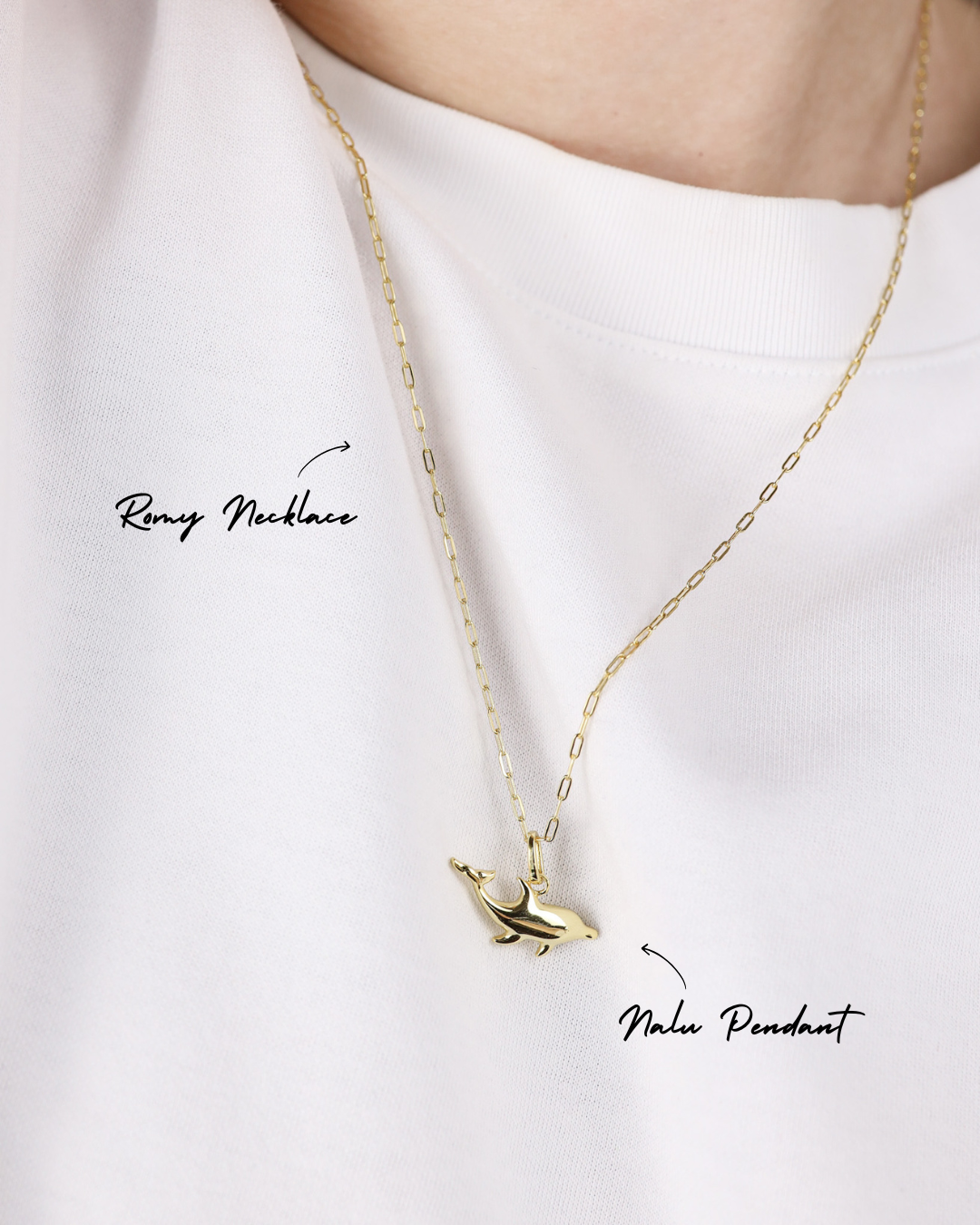 Gold necklace with a pendant on a white background
