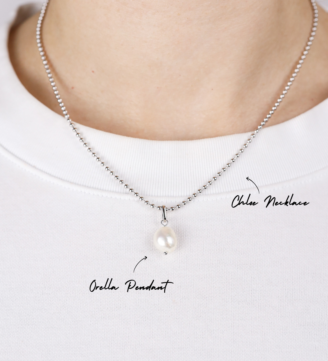 Pearl necklace with pendant on a white background