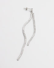 Silver earring with dangling crystal embellishments.