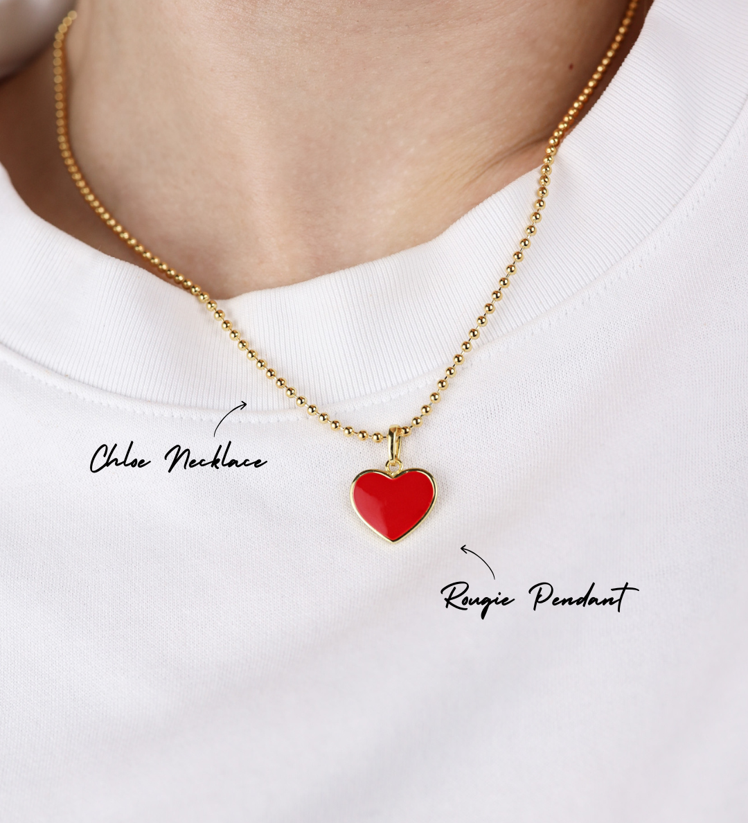 Red heart pendant necklace on a white background