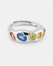 Yumi Ring in 925 sterling silver with an organic shape and colourful blue, green, yellow and pink stones