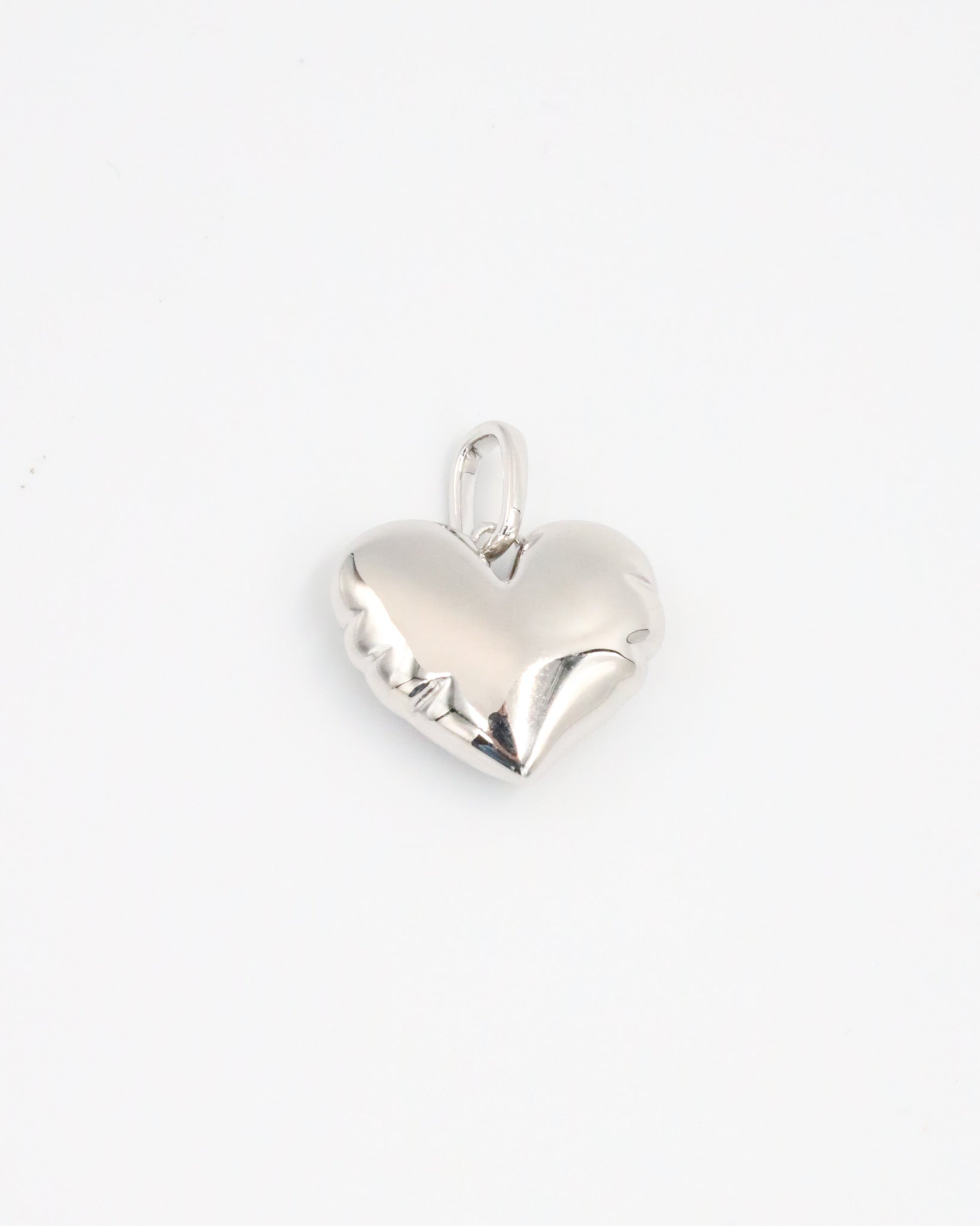 Front view of the Bella Silver heart pendant, made from rhodium-plated 925 sterling silver, highlighting its polished surface and sleek design.