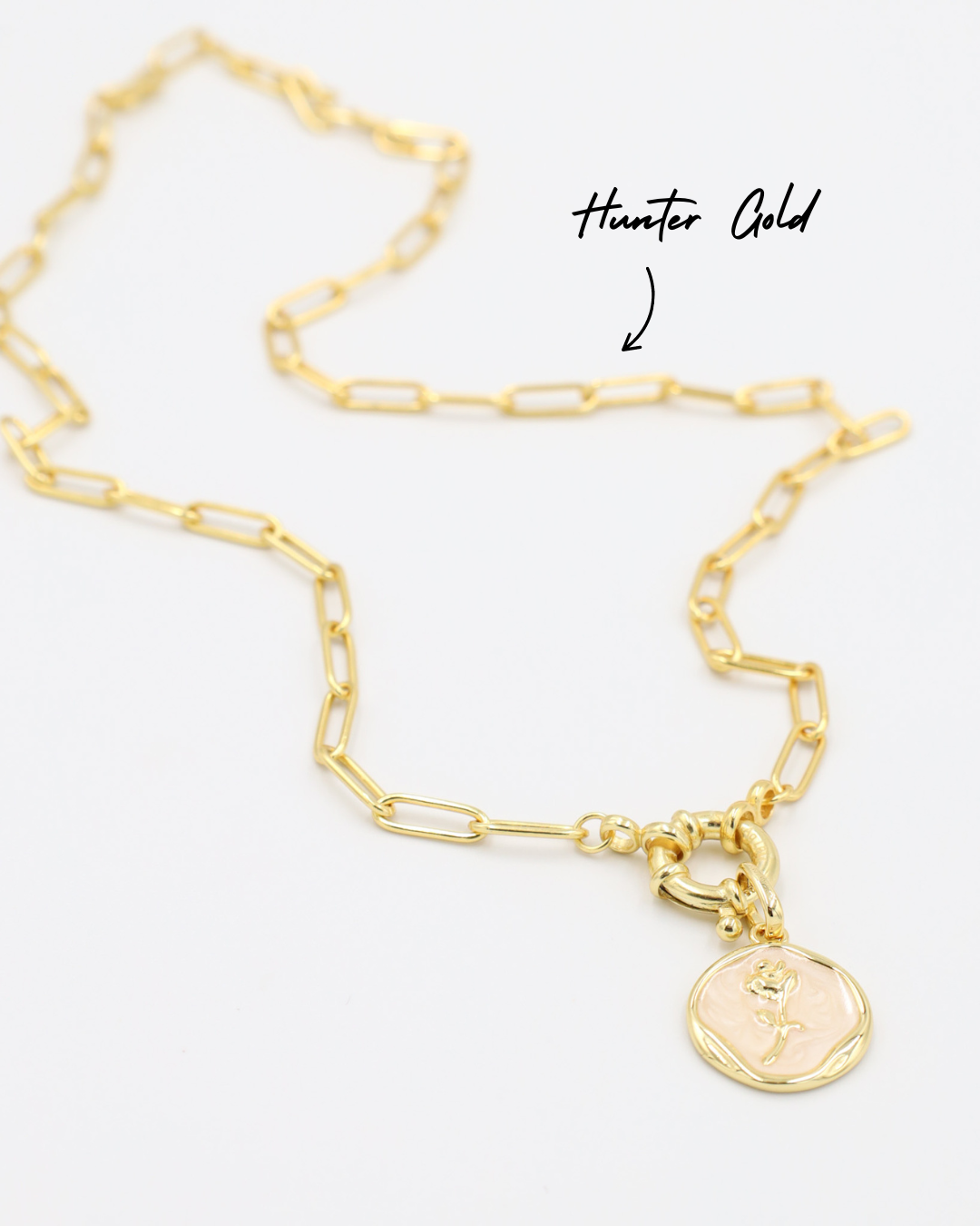 Gwendolyn Gold pendant with a flower design in soft enamel, elegantly paired with a gold-plated 925 sterling silver chain.