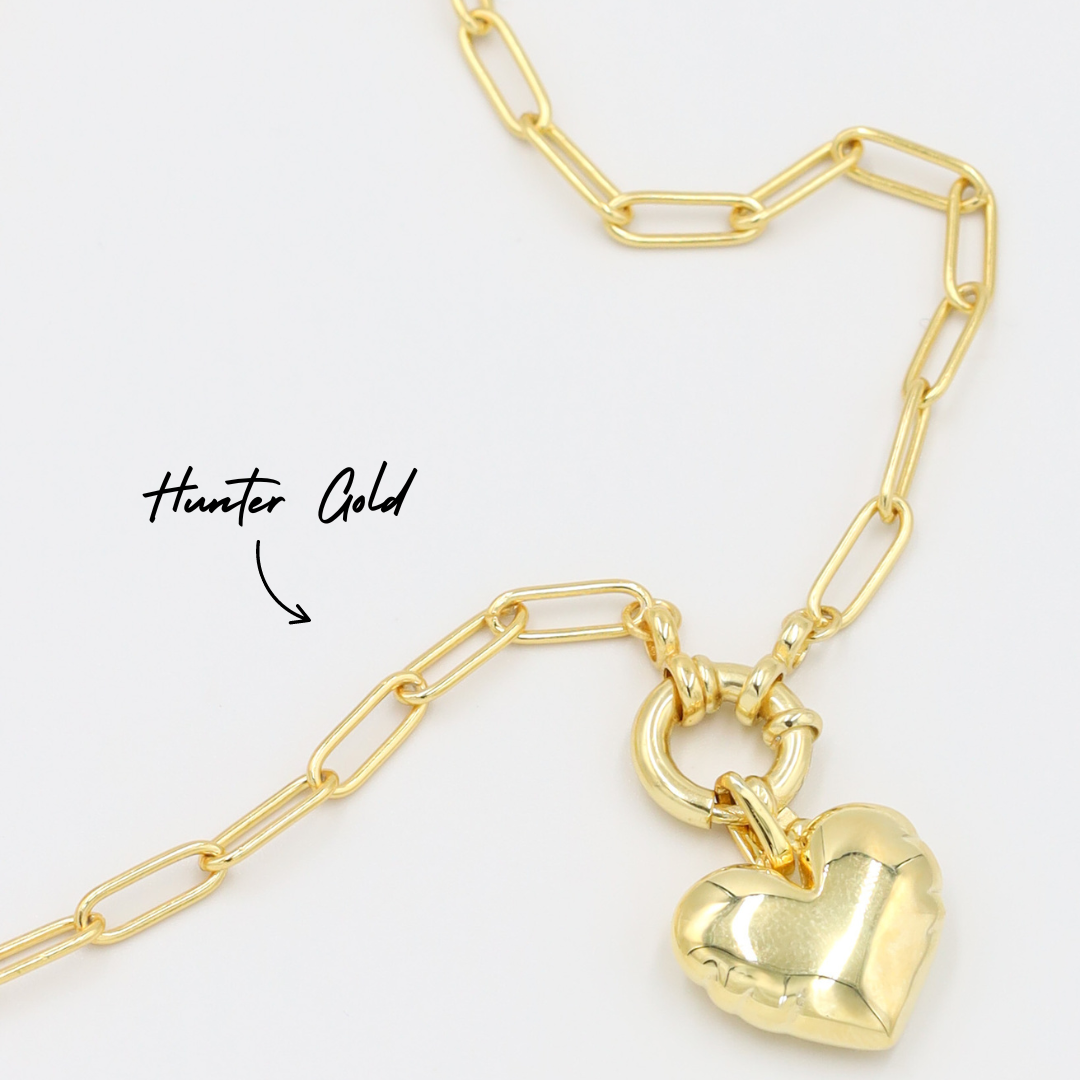 Hunter Gold chain necklace featuring the Bella Gold heart pendant, both crafted from gold-plated 925 sterling silver.