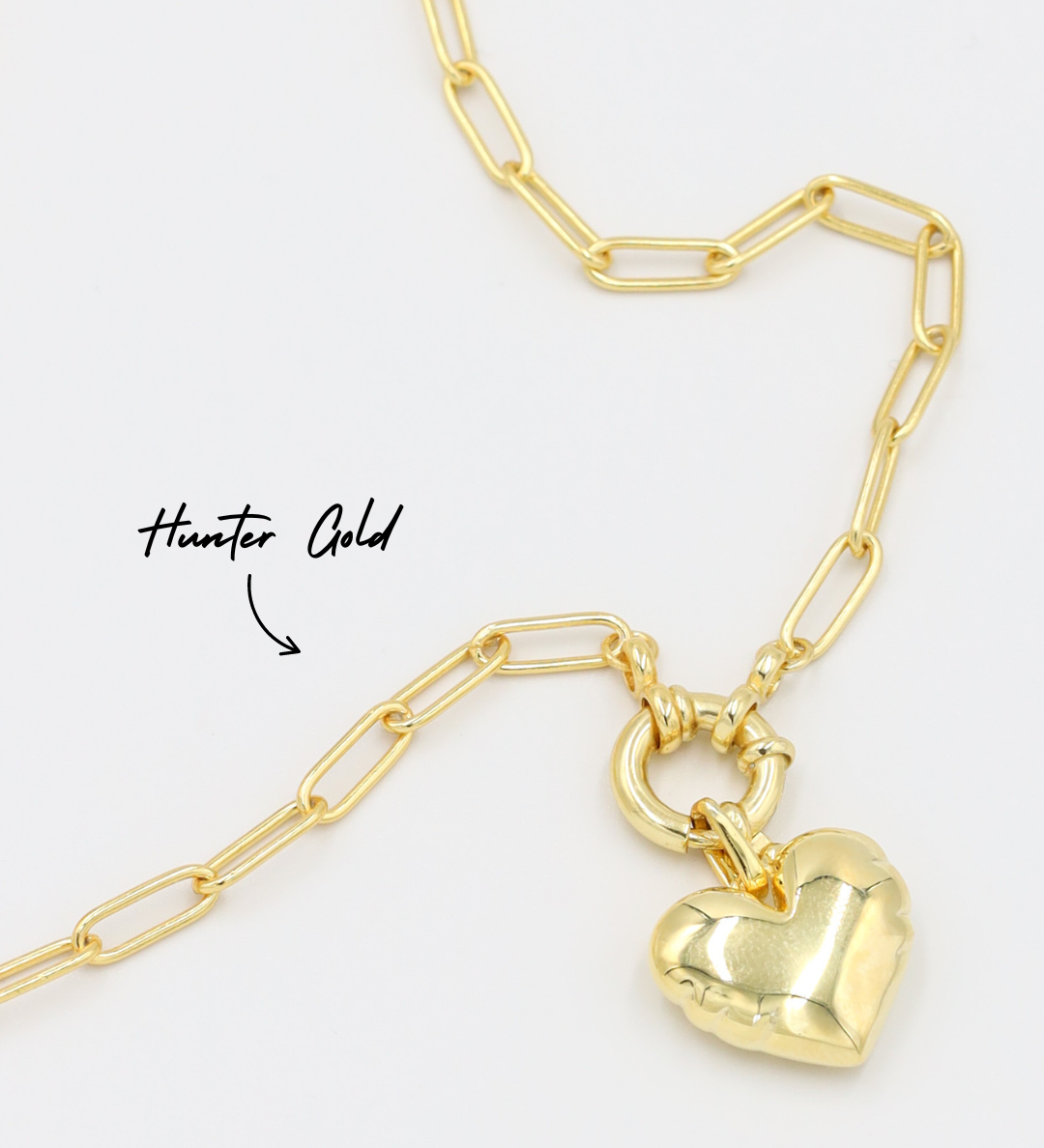 Hunter Gold chain necklace featuring the Bella Gold heart pendant, both crafted from gold-plated 925 sterling silver.