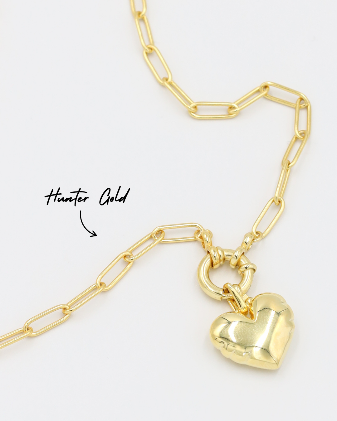 Hunter Gold chain necklace featuring the Bella Gold heart pendant, both crafted from gold-plated 925 sterling silver.