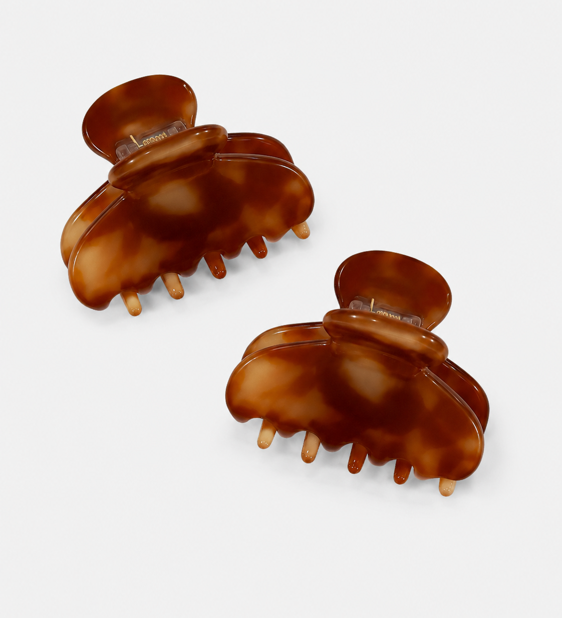 Two Tortoise Mini Hairclip in brown with a glossy tortoise pattern by ruru. studios
