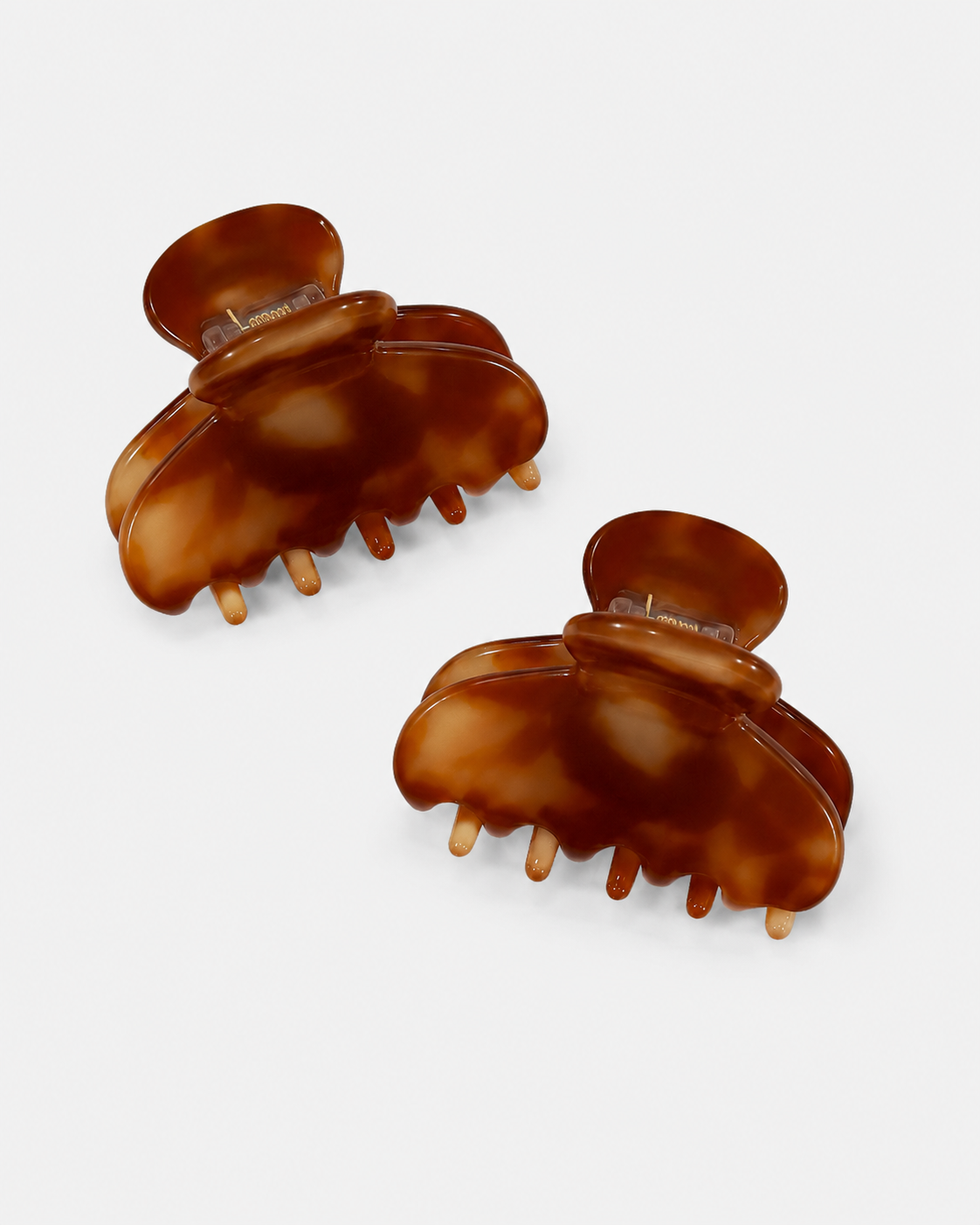 Two Tortoise Mini Hairclip in brown with a glossy tortoise pattern by ruru. studios