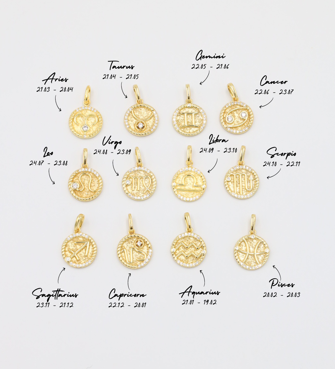 Labeled zodiac pendants in gold-plated sterling silver with zirconia stones, each symbol corresponding to the zodiac signs.